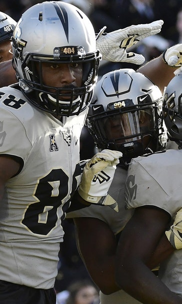 Adrian Killins rushes for 2 TDs, UCF tops Navy for 1st 6-0 start in program history